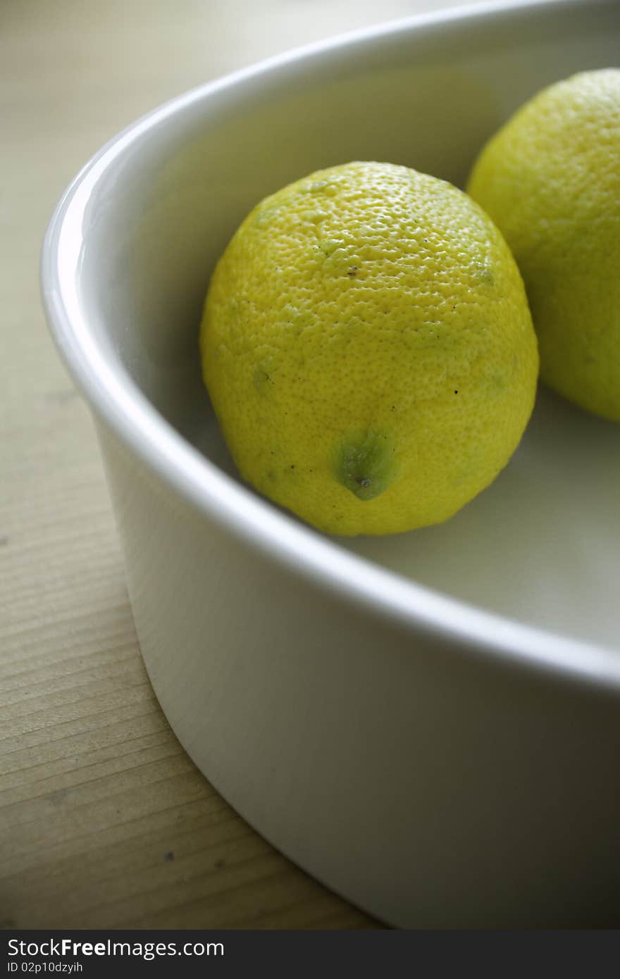 Lemons in porcelain tray