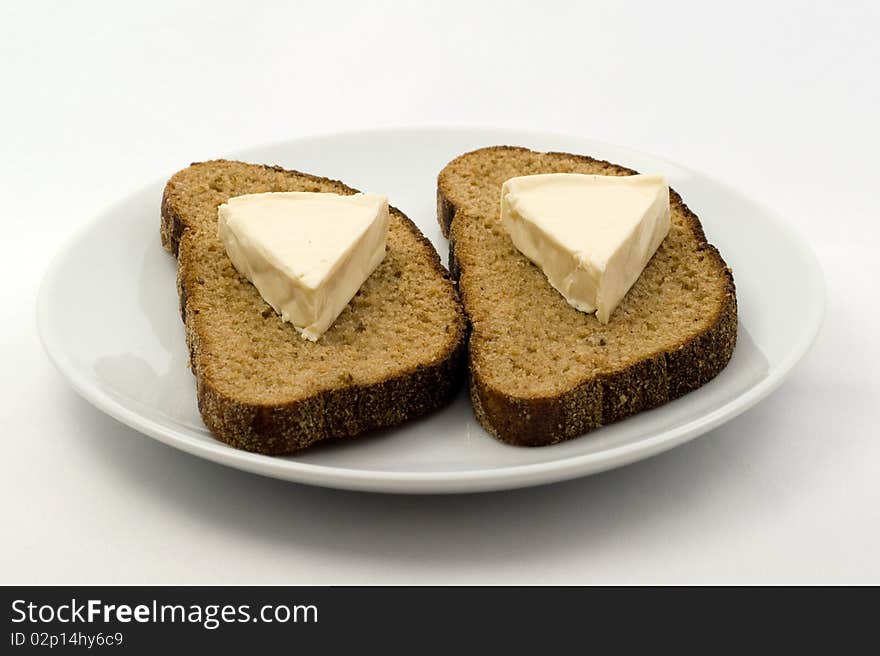 Slices of rye bread with cream cheese. Slices of rye bread with cream cheese