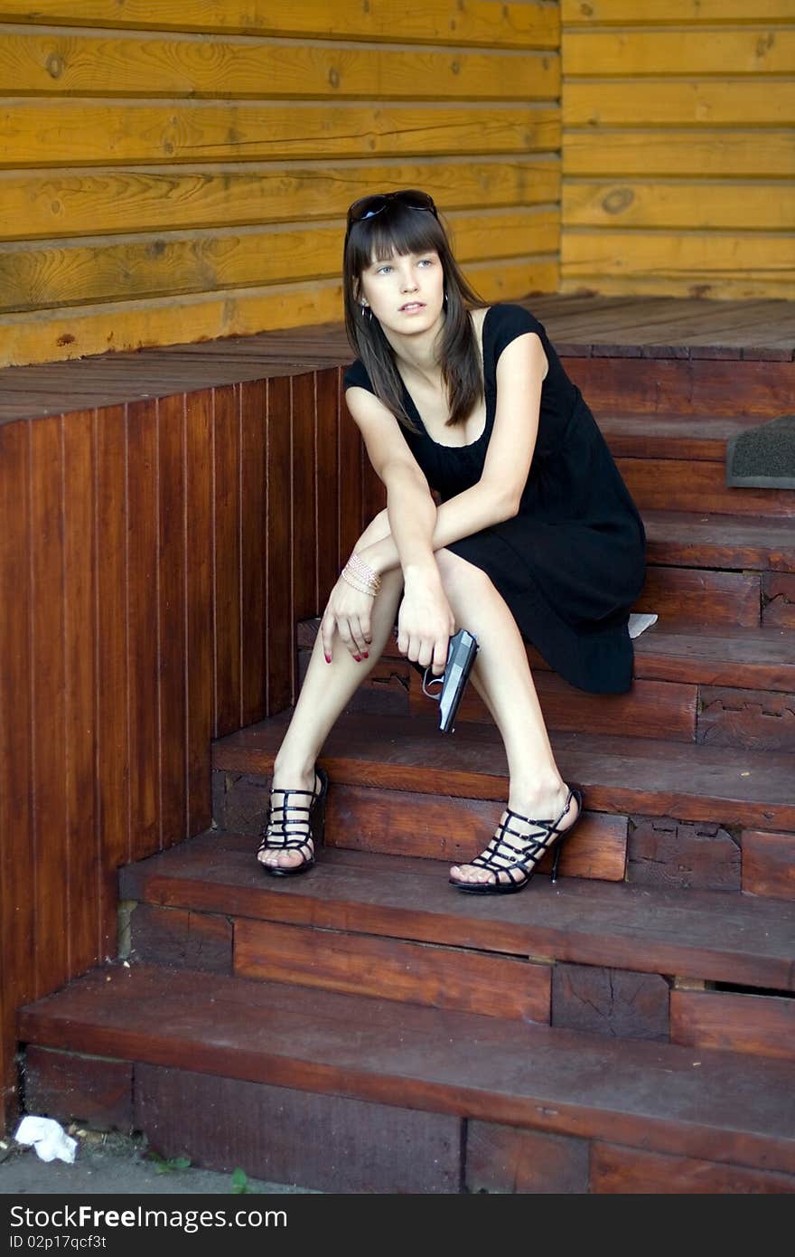 Girl sitting on stairs