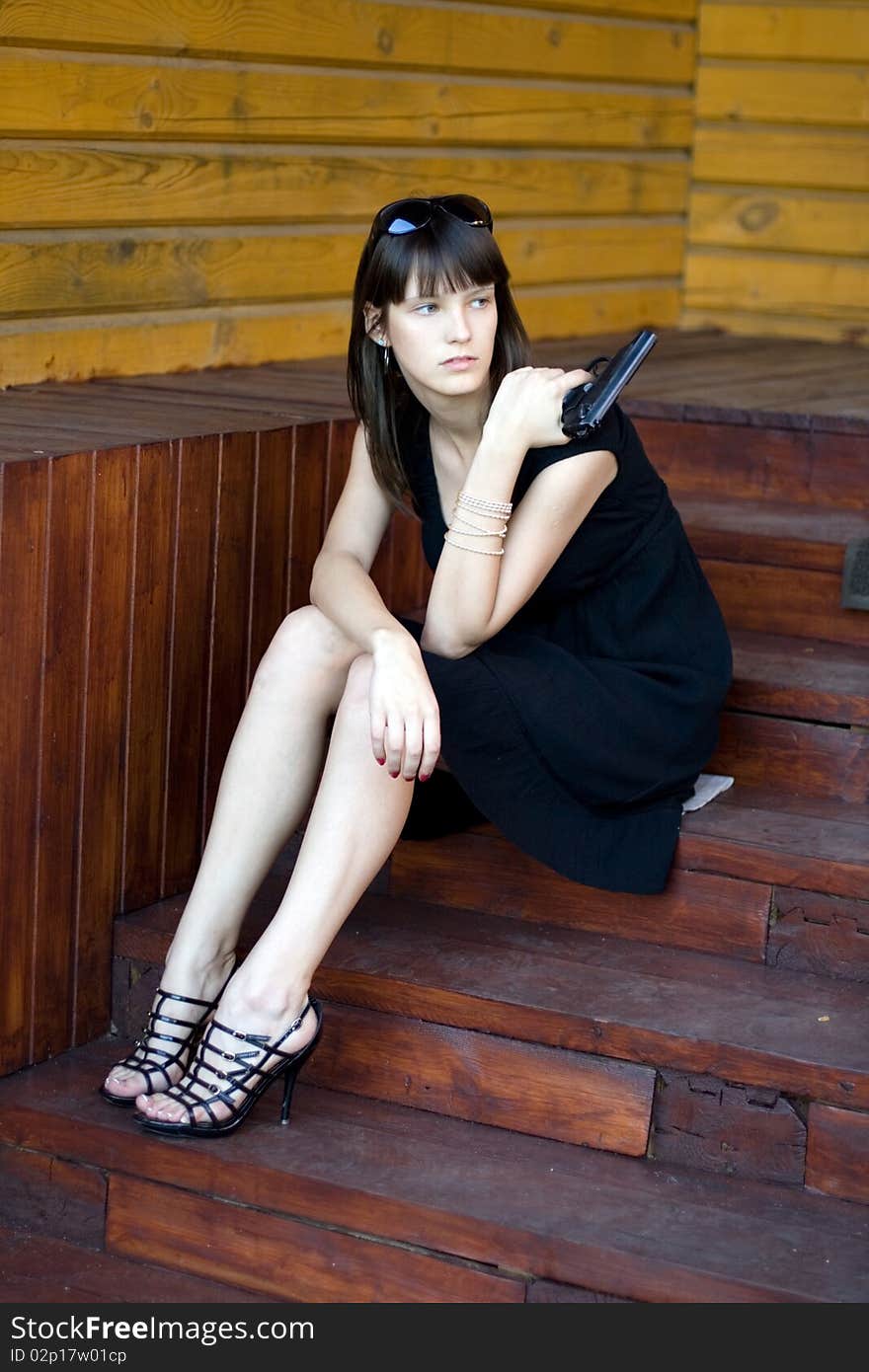 Girl sitting on stairs