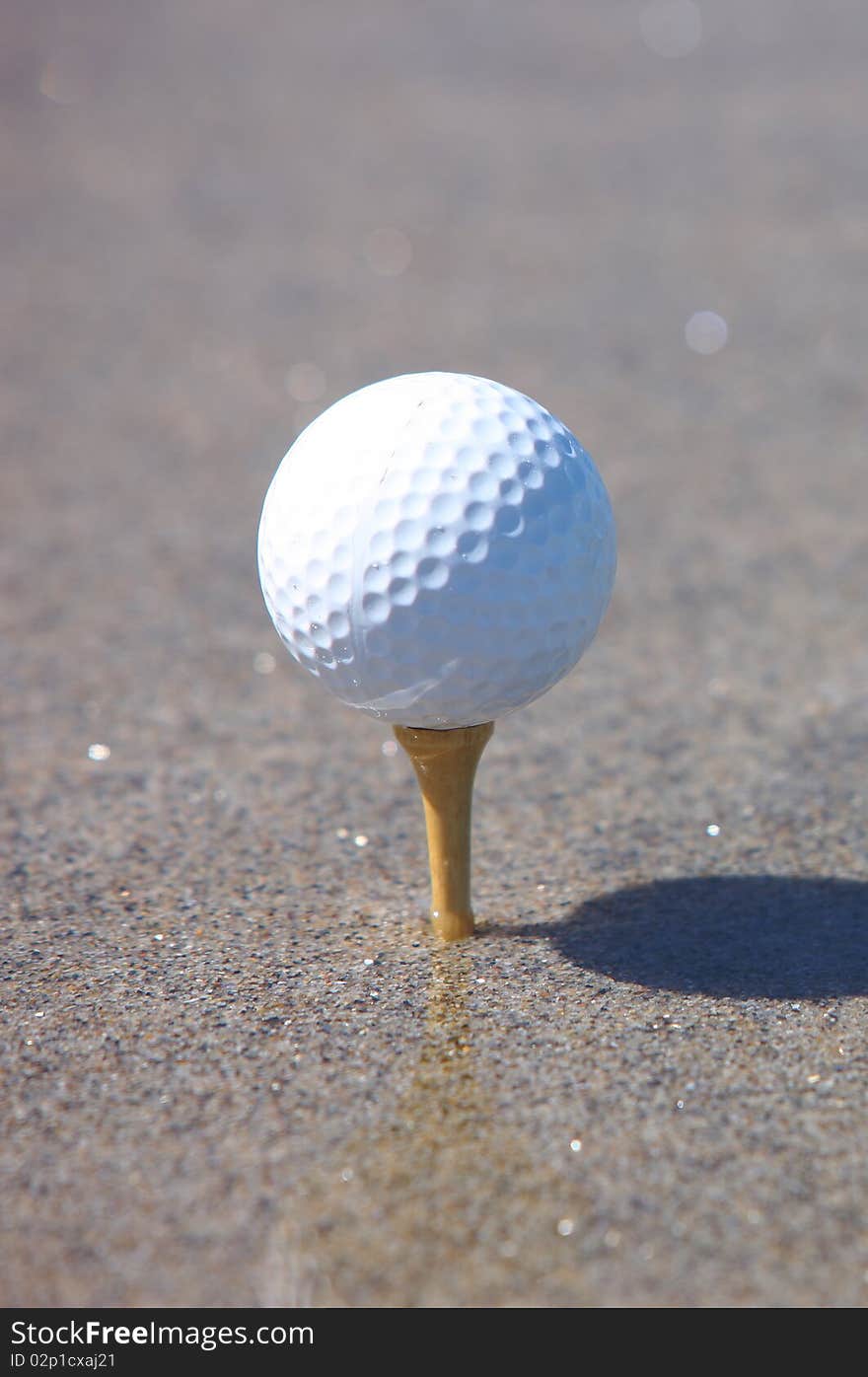 Golf ball in the beach