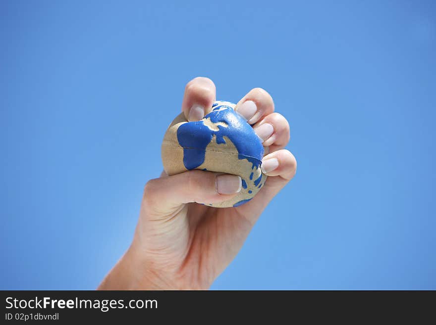 Hand holding the world globe. Hand holding the world globe