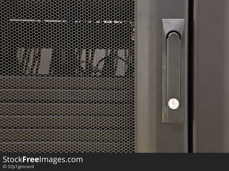 Black iron door of a case with the computer equipment. Black iron door of a case with the computer equipment