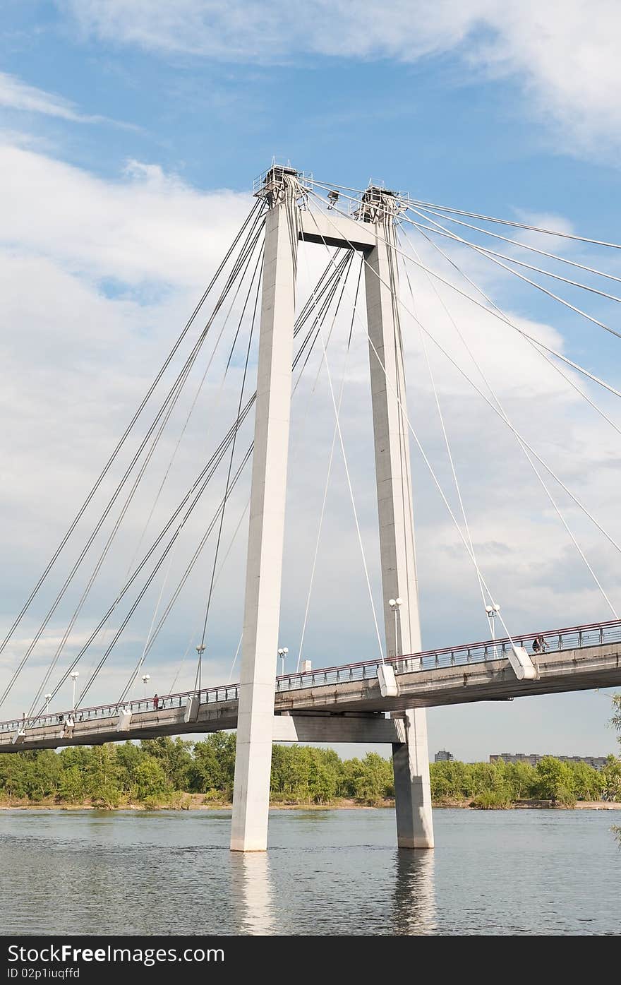 Bridge through river on background cloud