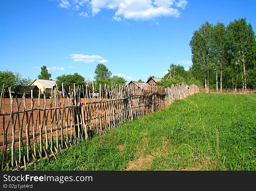 Old fence field plow near