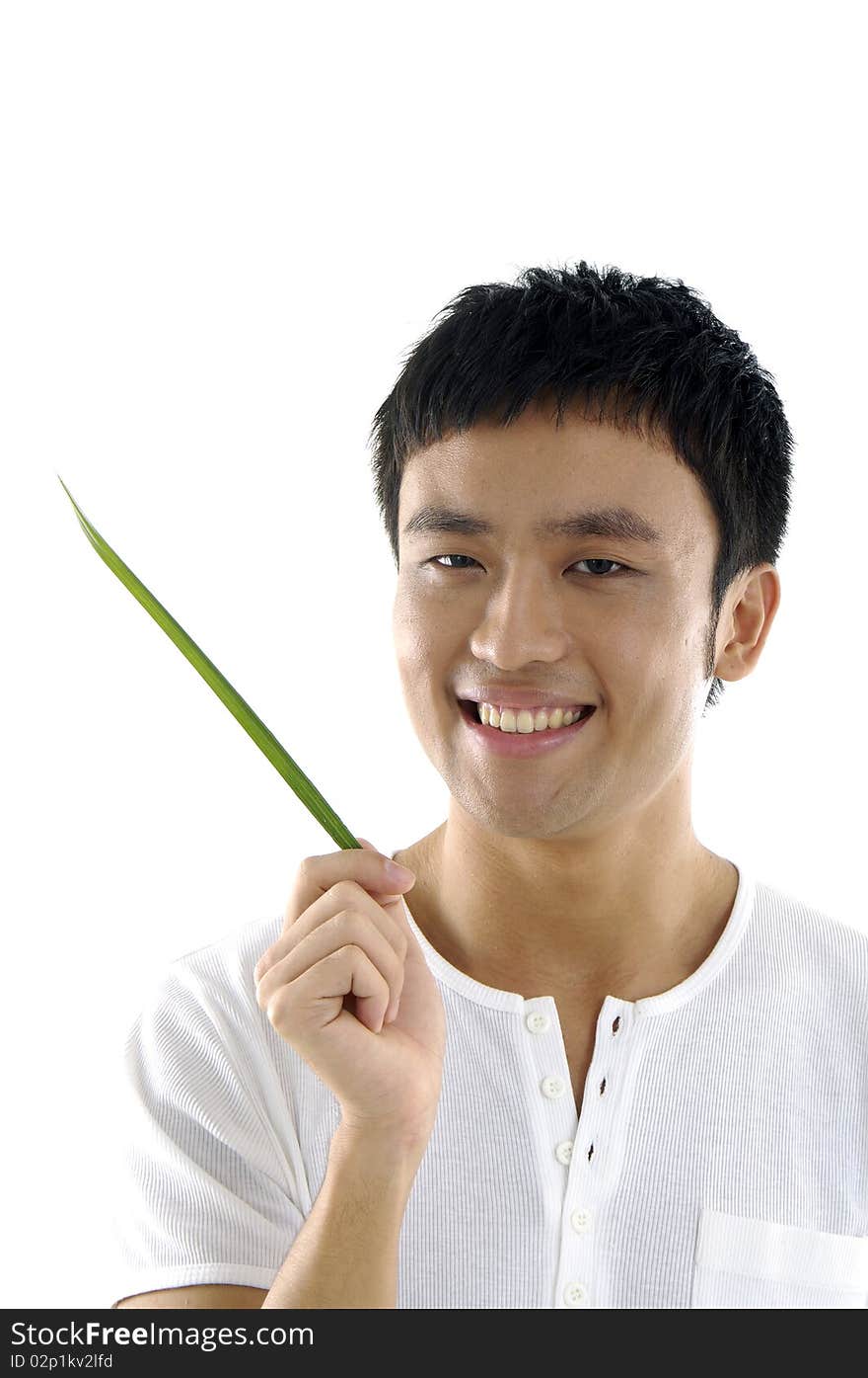 Young man hand holding a green leaf