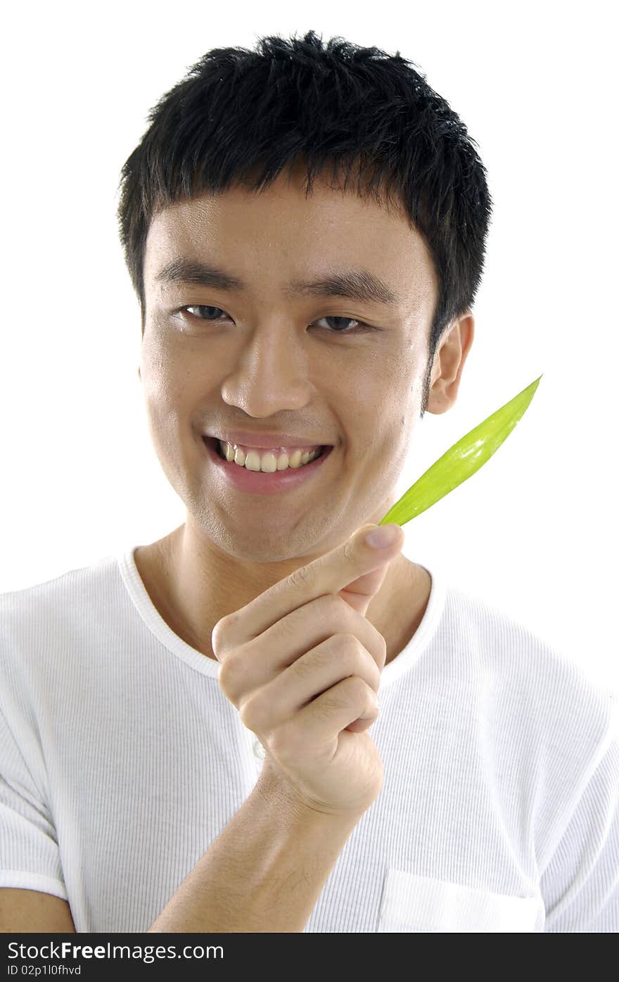 Young man hand holding a green leaf