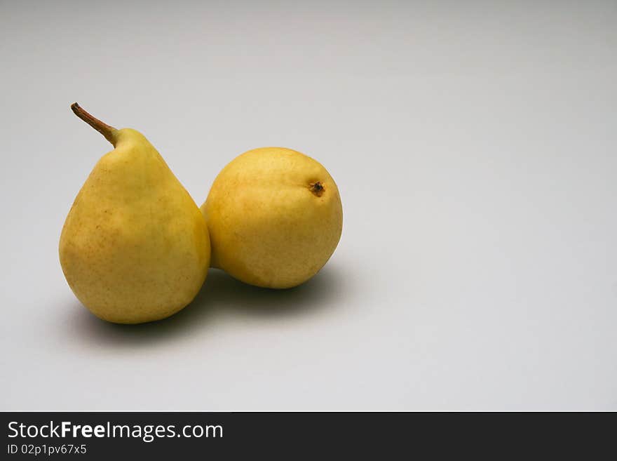 Two Yellow Pears, isolated on white background.