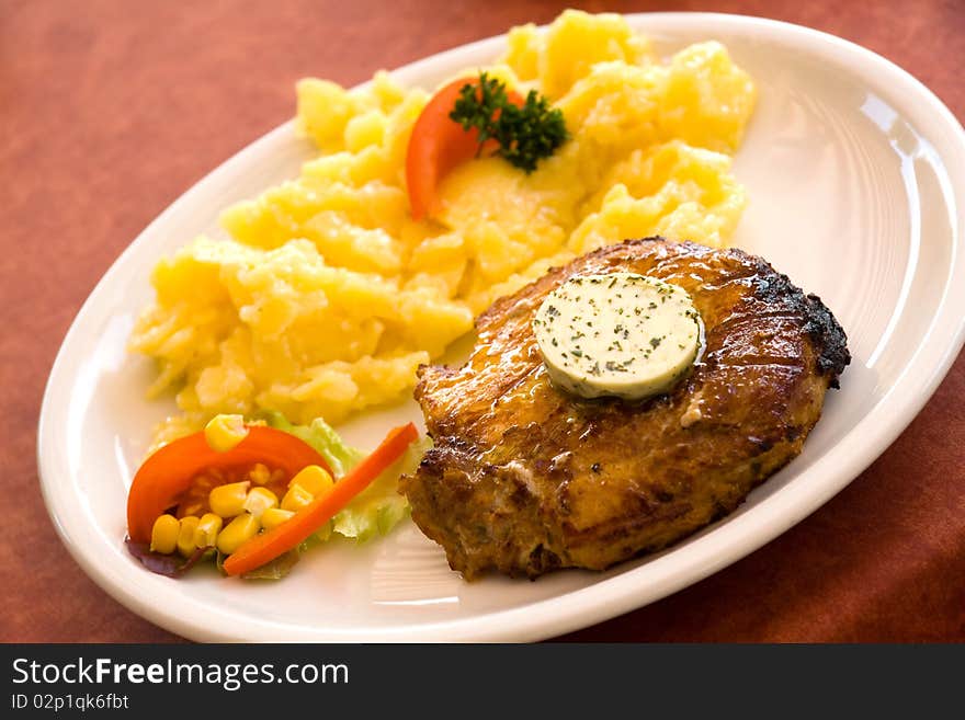 Steak of pork,grilled-with salad of potatoes