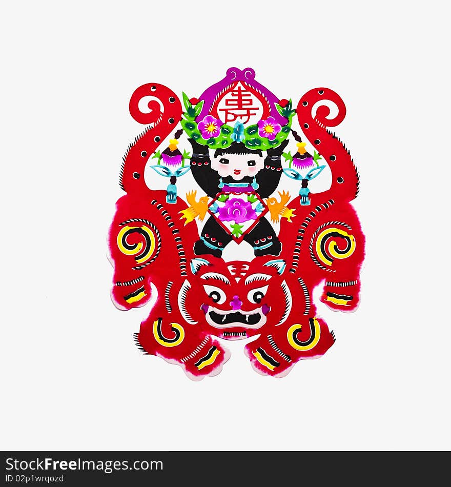 This paper-cutting features a child riding two tigers. The child holds a Chinese character of “longevity”, wishing for good luck. This paper-cutting features a child riding two tigers. The child holds a Chinese character of “longevity”, wishing for good luck.
