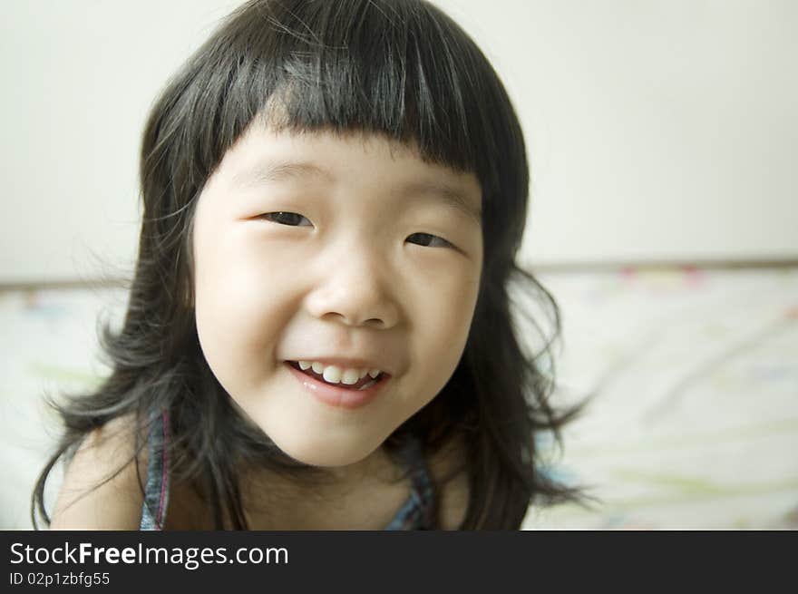 Cute asian girl looking at camera. Cute asian girl looking at camera