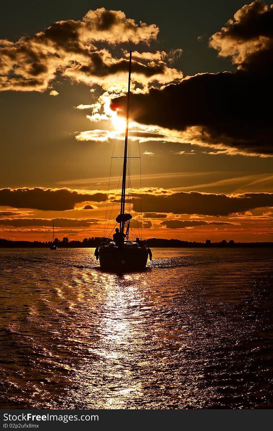 Yacht at sunset.