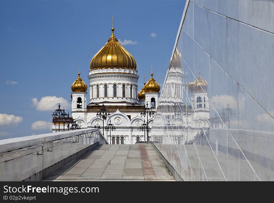 View of Christ the Savior Cathedral and its reflection in marble banister leading to the Patriarchal Bridge, Moscow, Russia