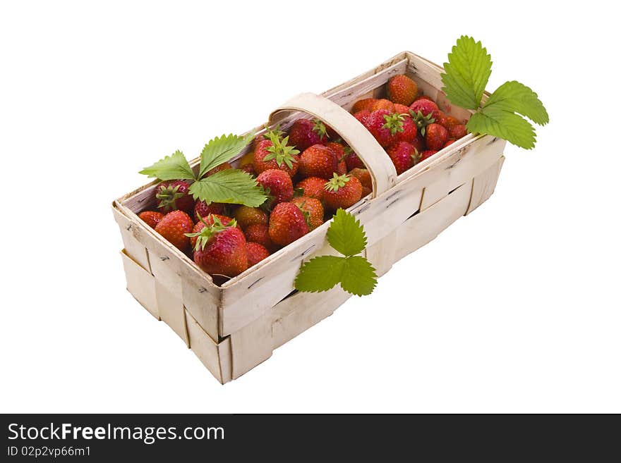 Fresh juicy strawberries in wooden basket isolated on white. Fresh juicy strawberries in wooden basket isolated on white