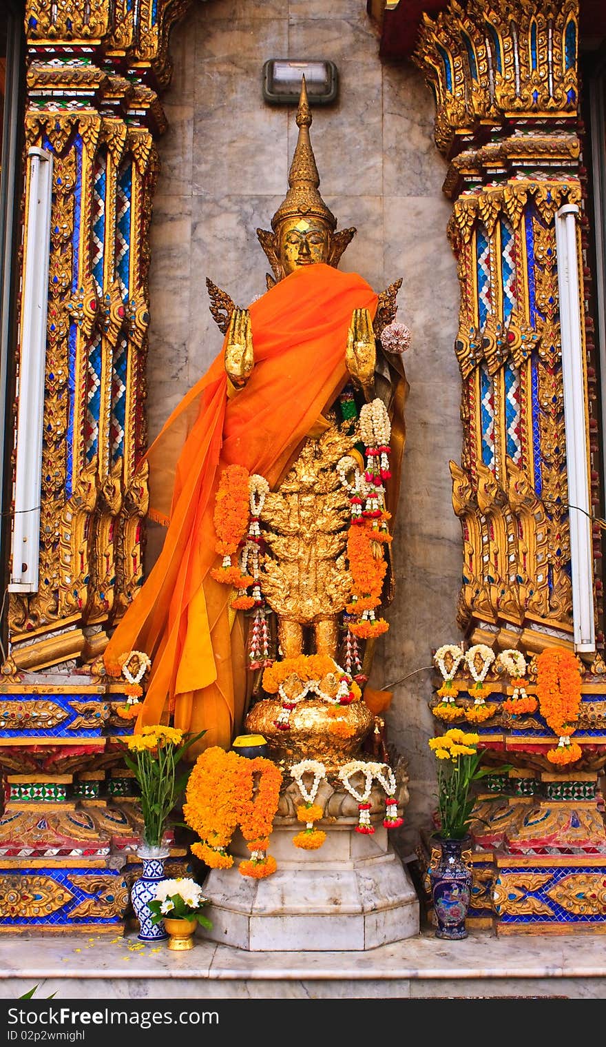 Standing Buddha image in Wat Don Mueng temple, Bangkok Thailand