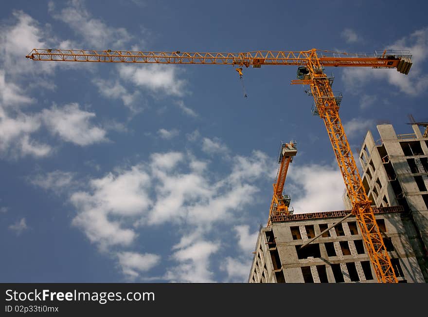 Crane at the blue sky with clouds. Crane at the blue sky with clouds