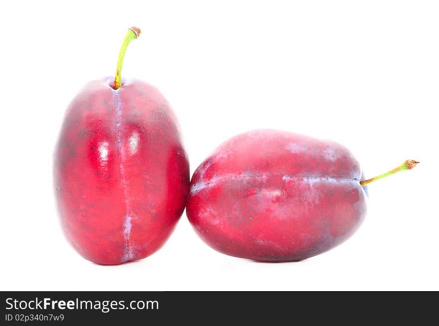 2 plums isolated over white