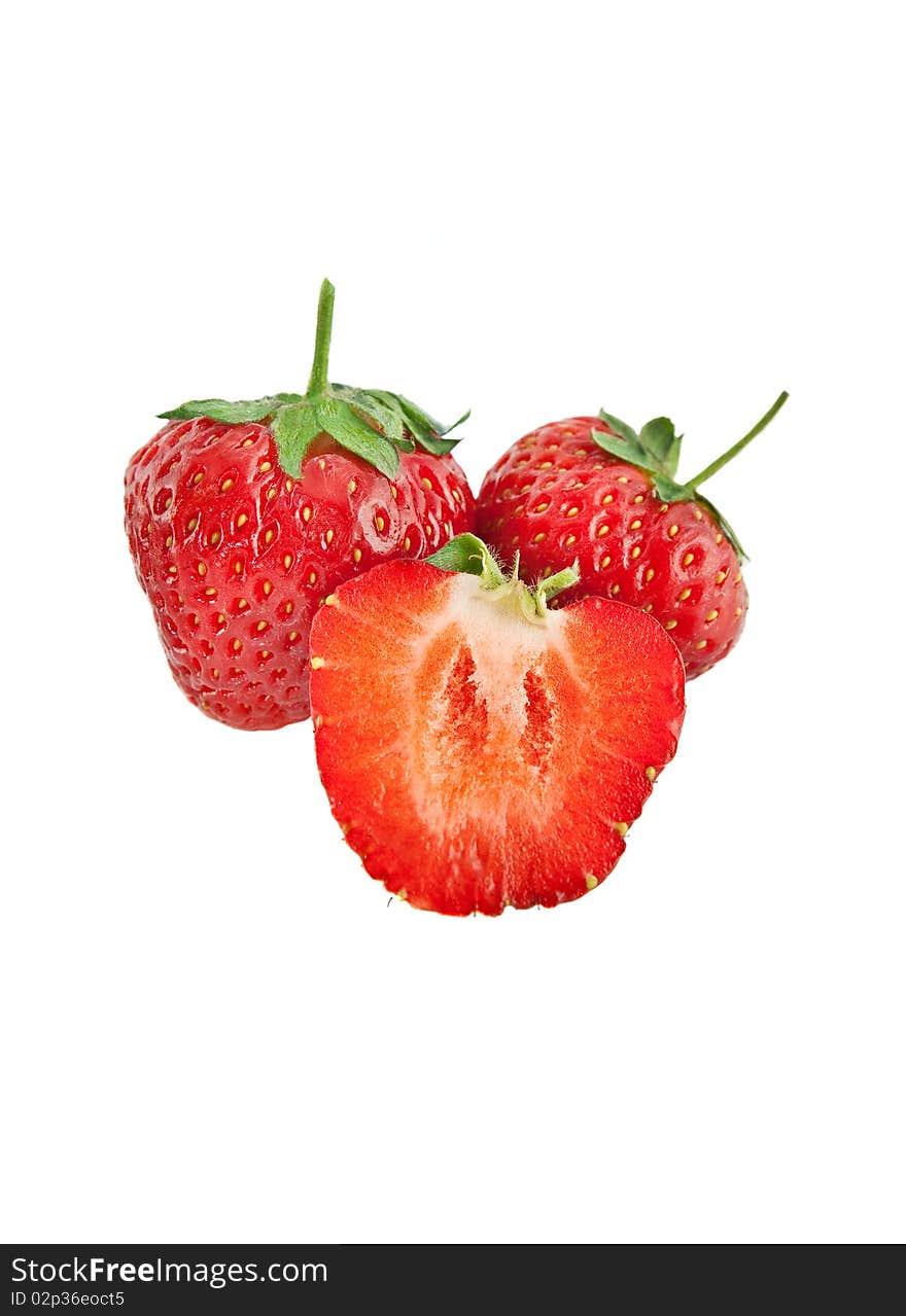 Three strawberries isolated on white background