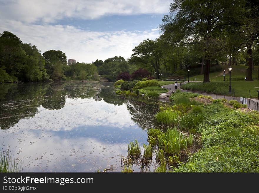 Central Park - New York City at the lake with Gapstow bridge. Central Park - New York City at the lake with Gapstow bridge