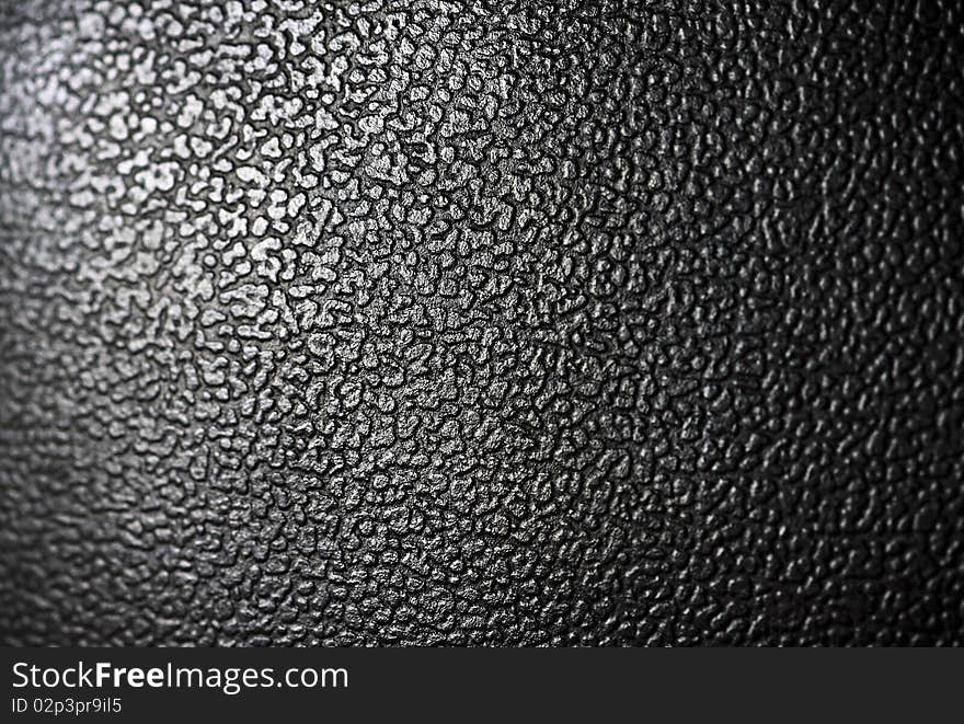 Close-up view of black leather texture. Close-up view of black leather texture