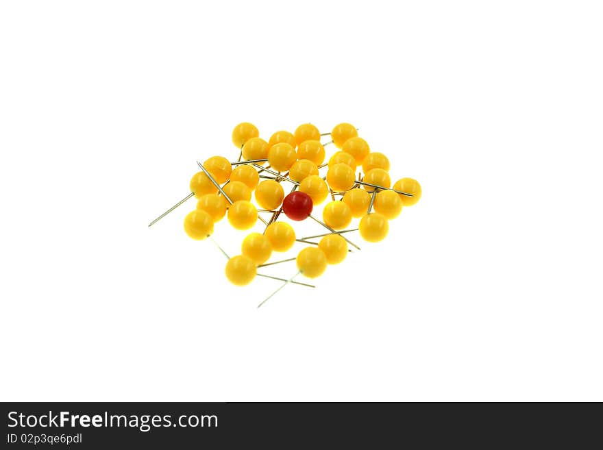 A red pin surrounded by a yellow pin isolated in white. A red pin surrounded by a yellow pin isolated in white