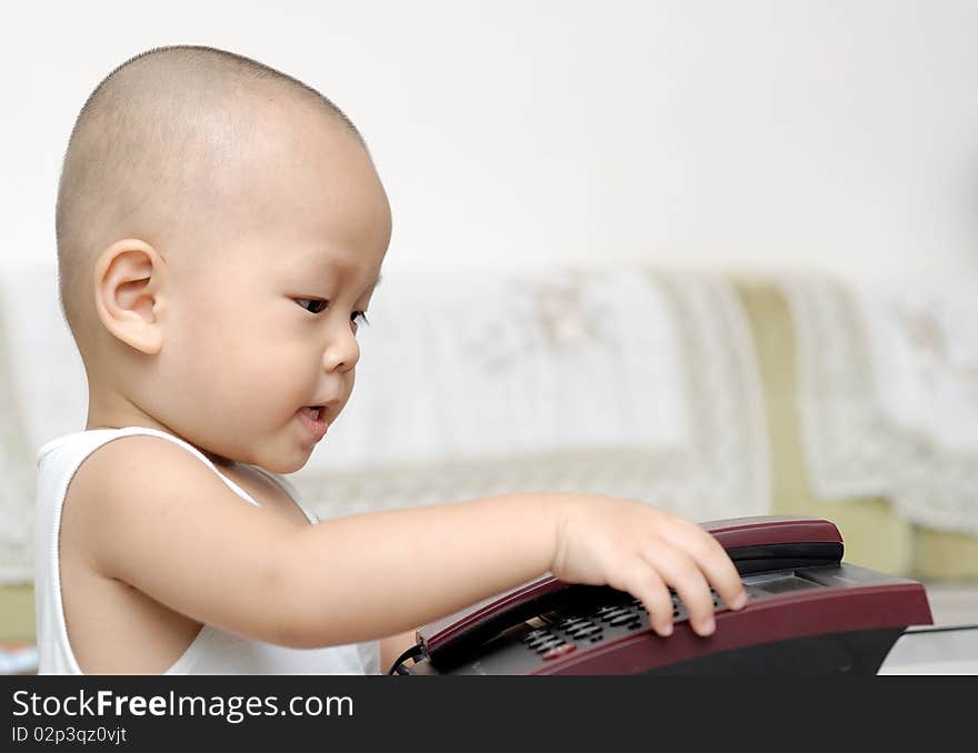 Baby with telephone