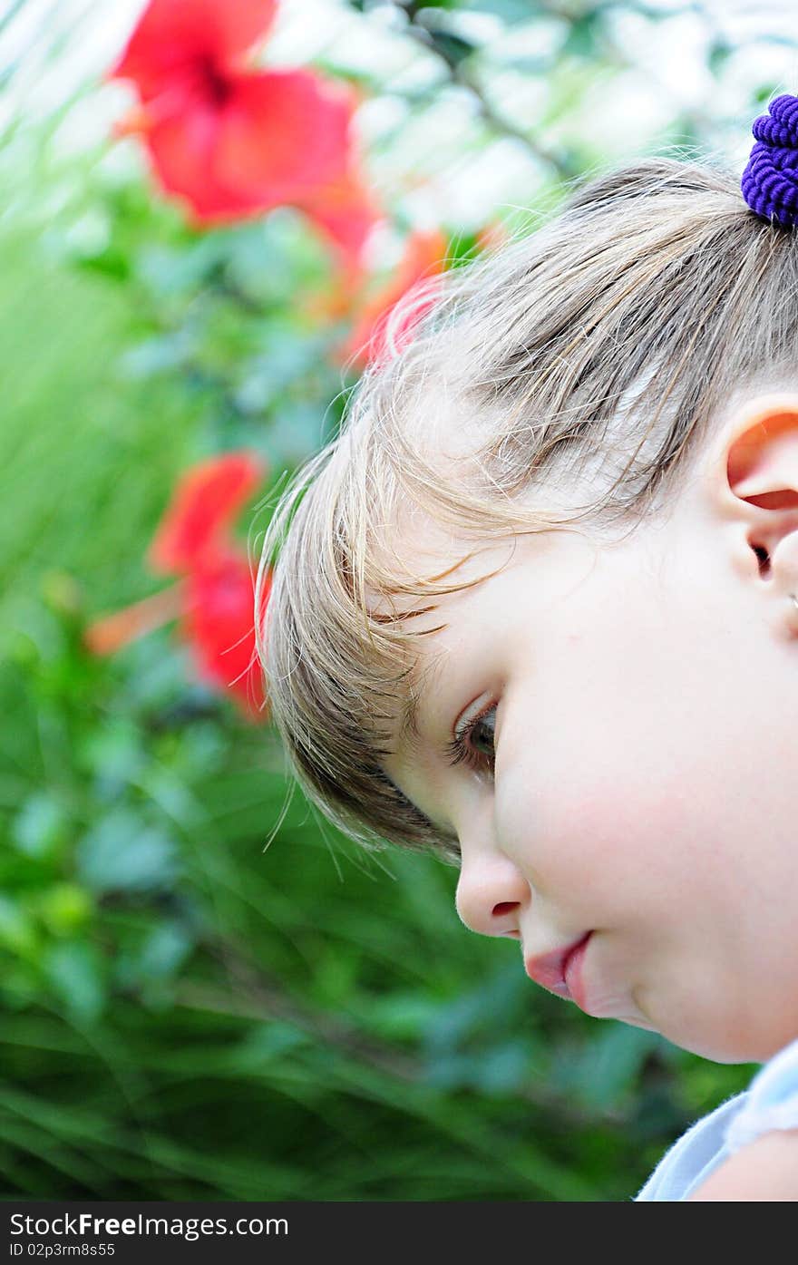 Girl with flowers in the garden. Girl with flowers in the garden