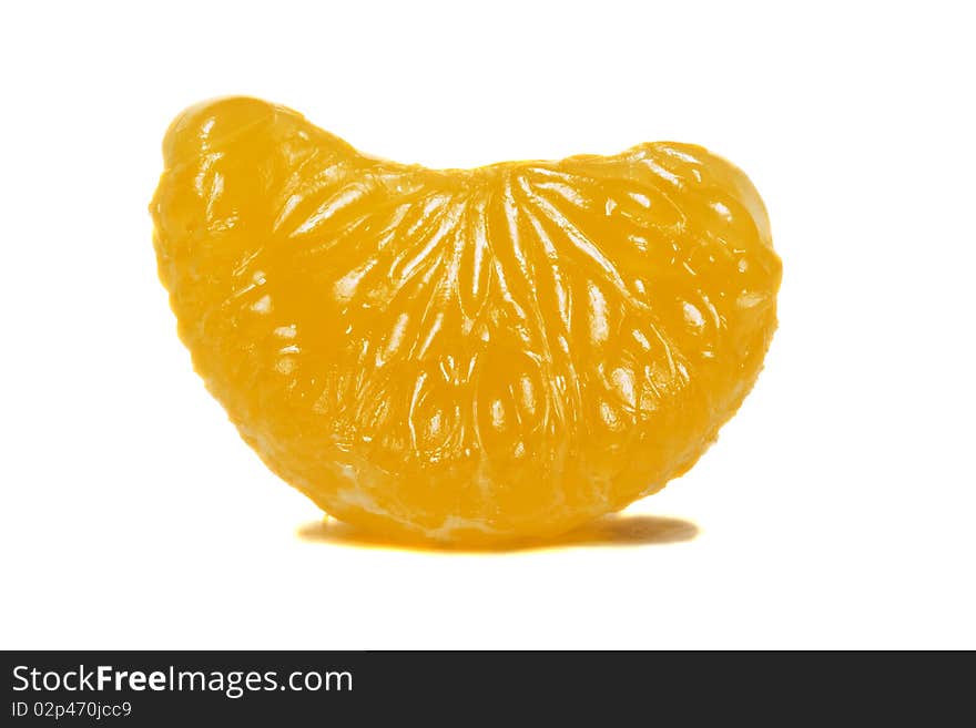 Completely cleared from peel one orange segment. Completely cleared from peel one orange segment