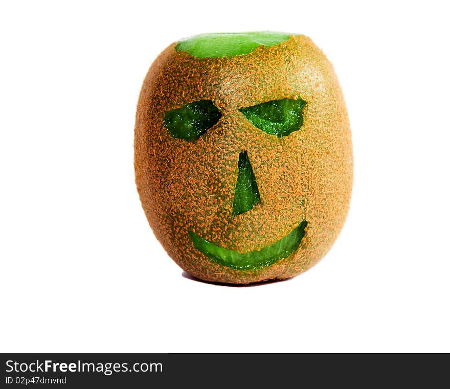 Head (eye, nose, mouth, bald head), cut out from the ripened fruit kiwi. Head (eye, nose, mouth, bald head), cut out from the ripened fruit kiwi