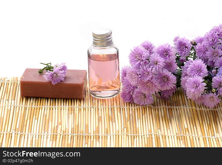 Spa bottles and daisies with soap. Spa bottles and daisies with soap