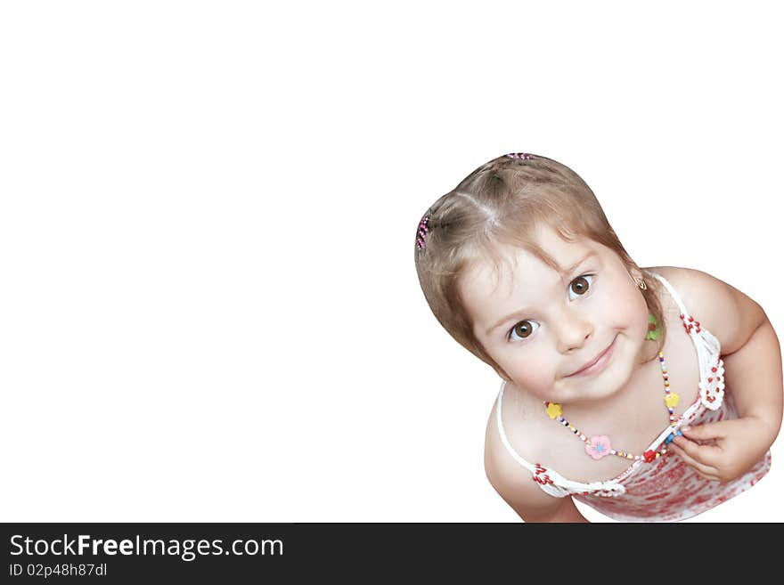 The girl on white in a dress a beads and with hairpins looks with interest top. The girl on white in a dress a beads and with hairpins looks with interest top