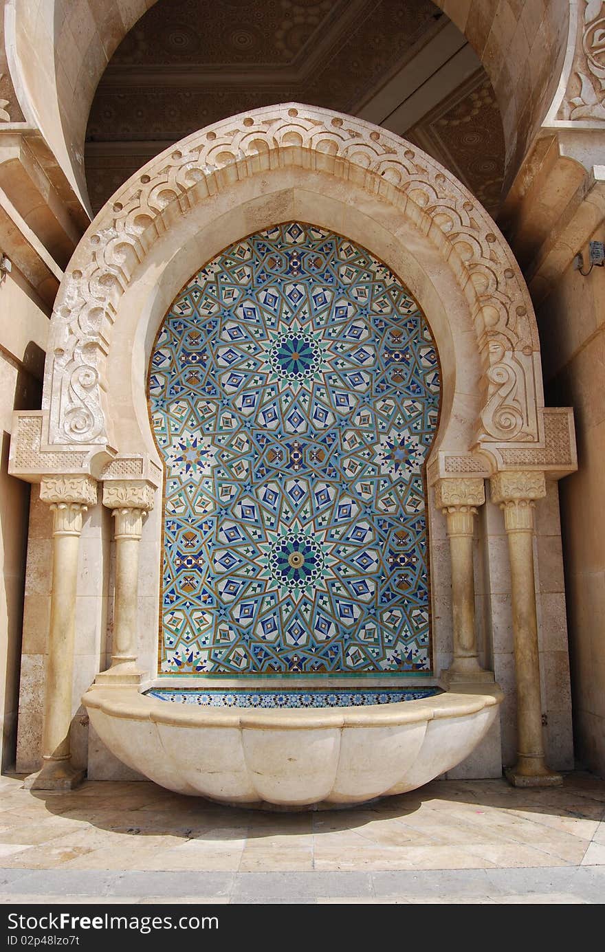 An elaborate water fountain at a mosque in Casablanca, Morocco. An elaborate water fountain at a mosque in Casablanca, Morocco.