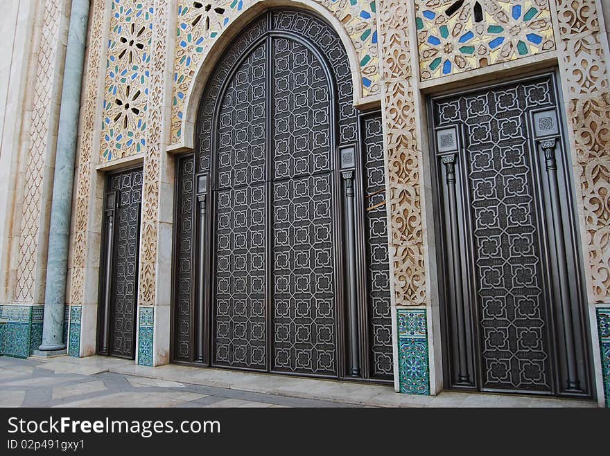 An elaborate entrance to one of the largest Mosques in the world. An elaborate entrance to one of the largest Mosques in the world.