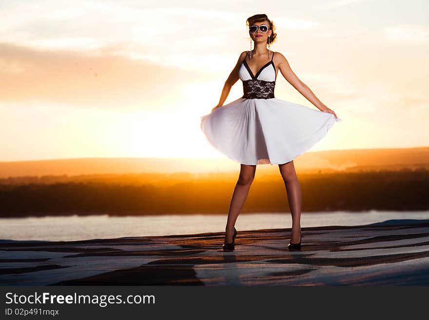 Beautiful girl in dress and sunglasses. Beautiful girl in dress and sunglasses