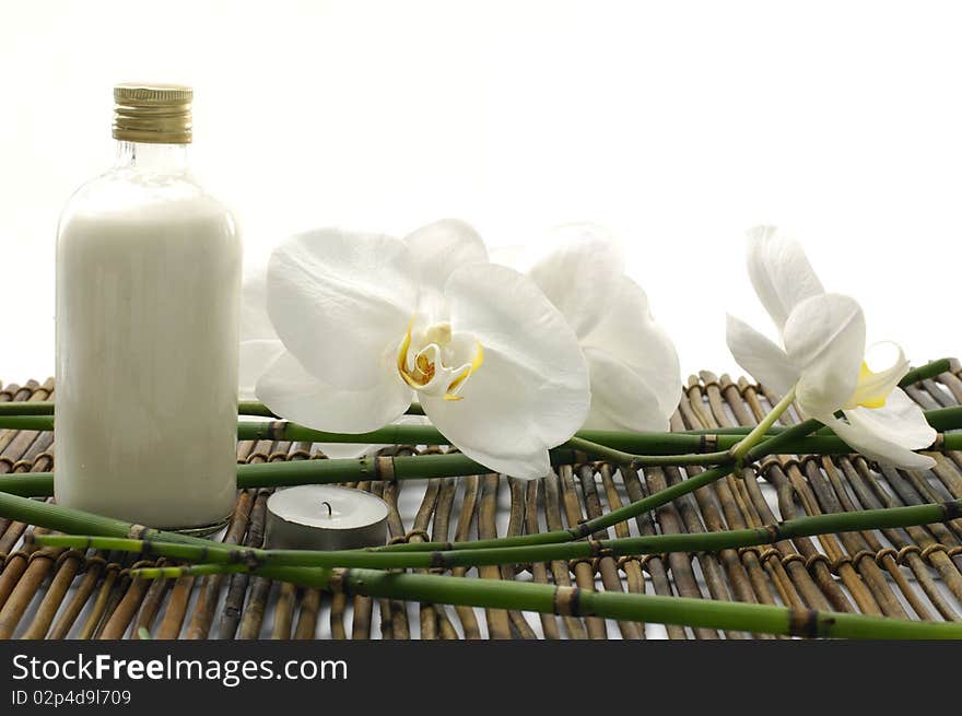 Body care items on bamboo mat background. Body care items on bamboo mat background