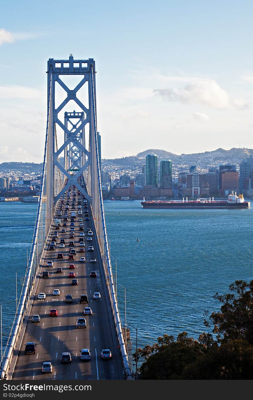 Bay Bridge and San Francisco seen from Treasure Island - motion blur on the moving cars. Bay Bridge and San Francisco seen from Treasure Island - motion blur on the moving cars.