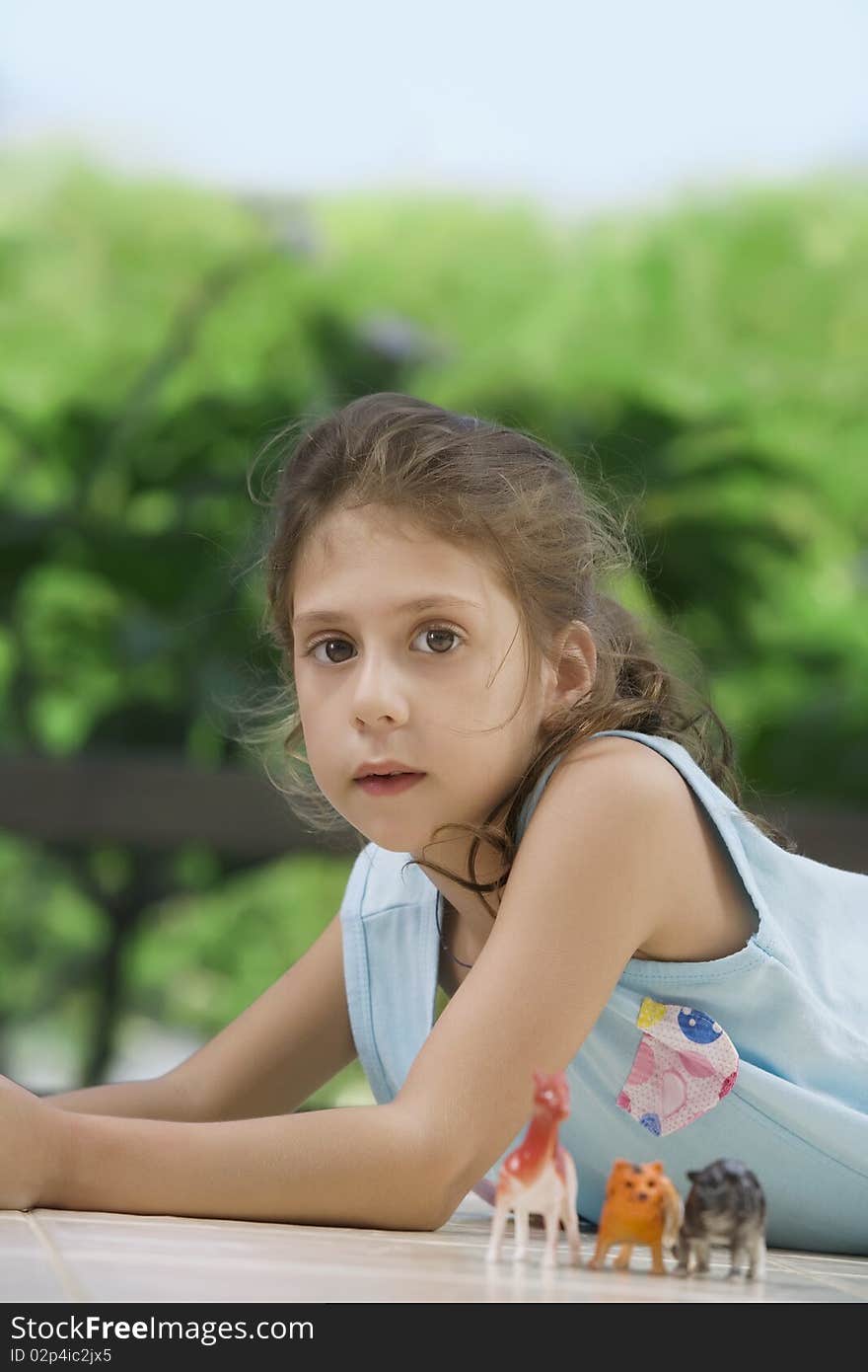 Portrait of little girl having good time in summer environment. Portrait of little girl having good time in summer environment