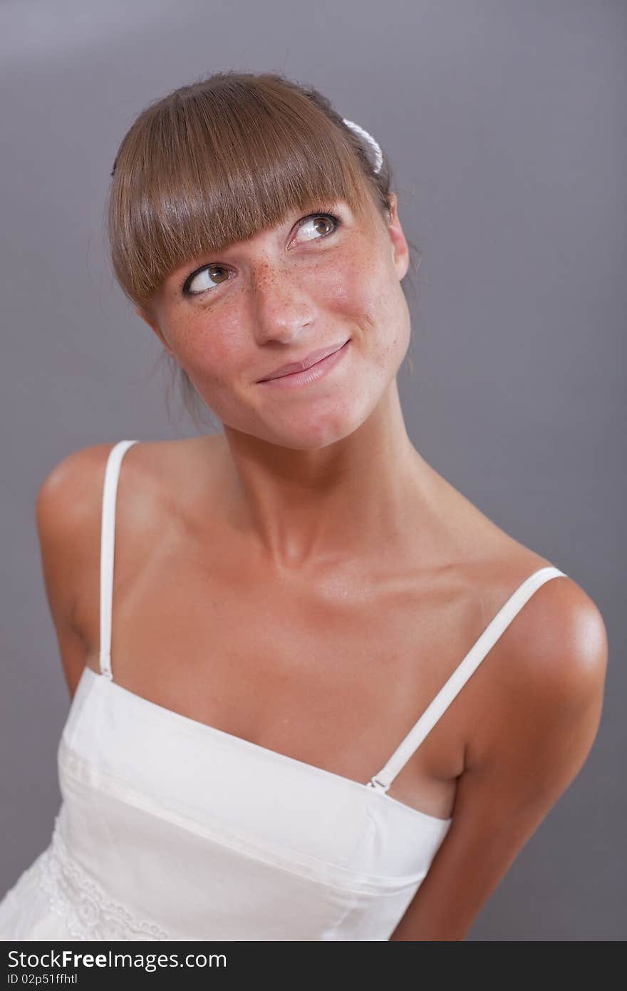 Happy woman in white dress