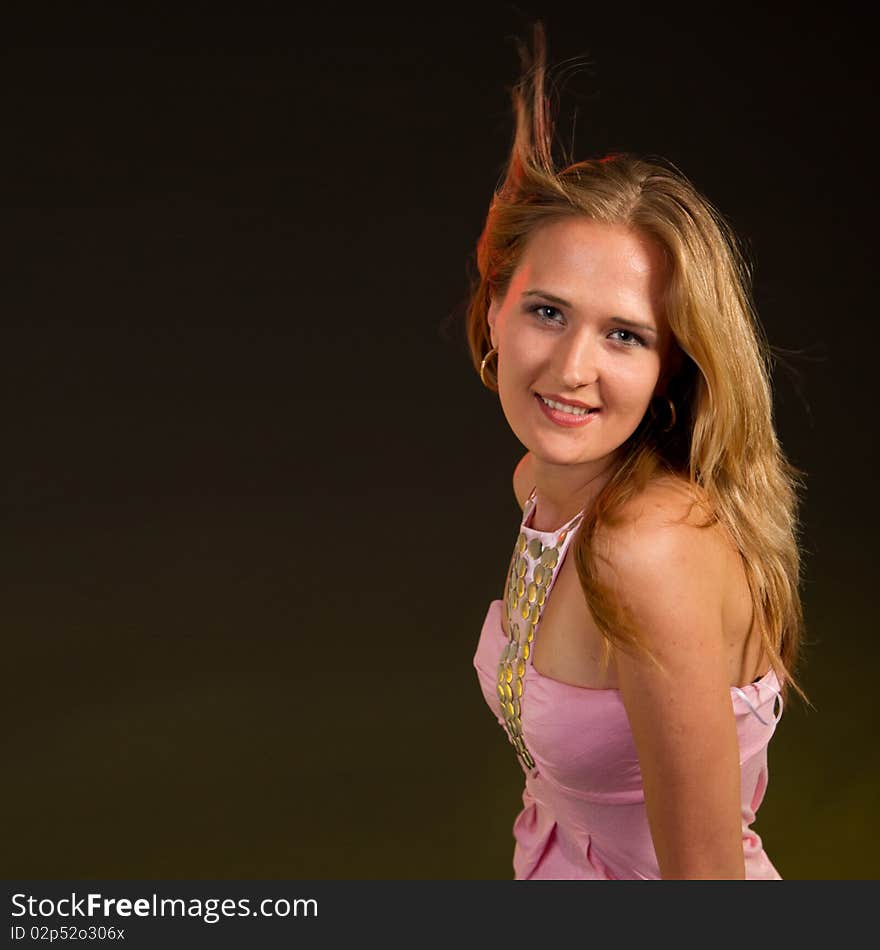 Young sexy woman with flying hair