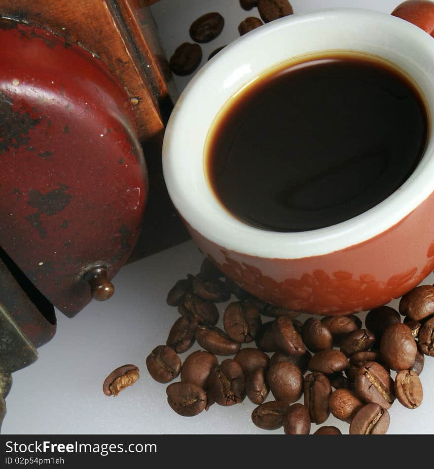 Cup of coffee and coffee beans