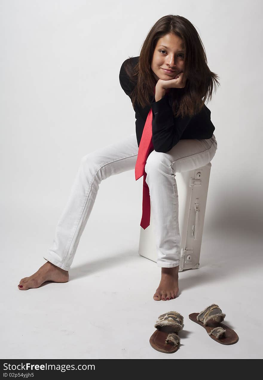 Girl with red tie on a white