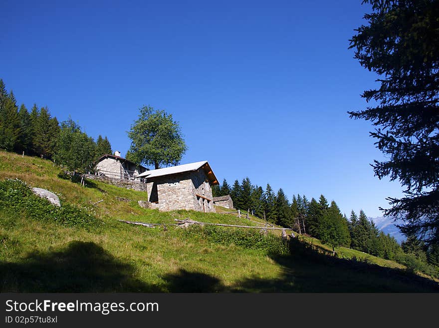 Mountain house in the middle of the lawn. Mountain house in the middle of the lawn