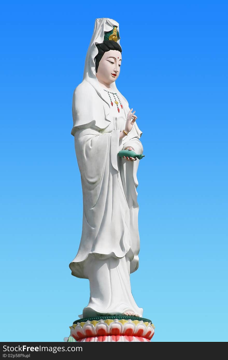 Chinese female statue on blue sky