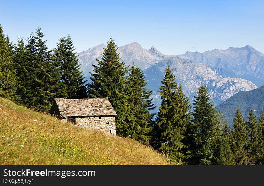 Mountain house in the middle of the lawn. Mountain house in the middle of the lawn