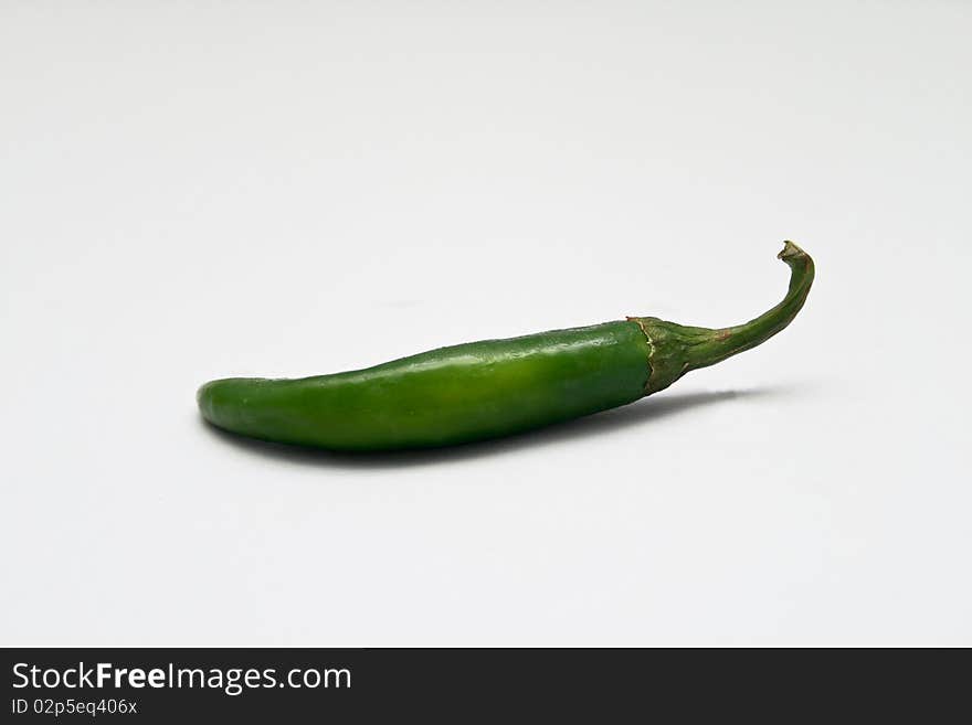 Green Chilli Pepper, isolated on white background.