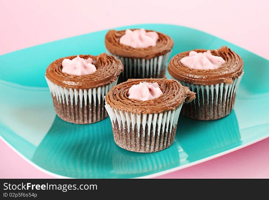 Shot of raspberry filled chocolate cupcakes upclose