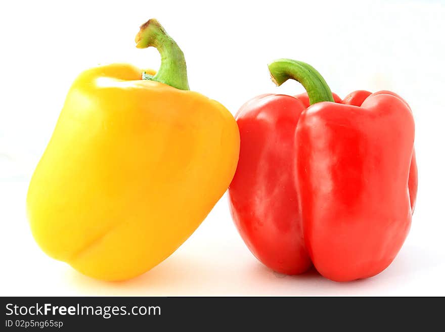 Red and Yellow pepper isolated on white background