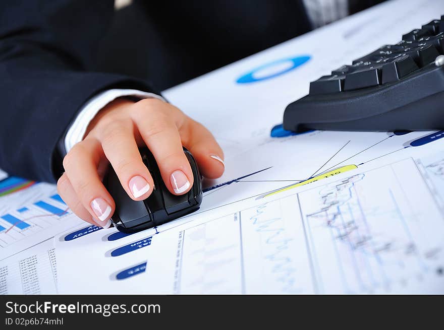 Workplace businessman. Charts, securities, charts on your desktop