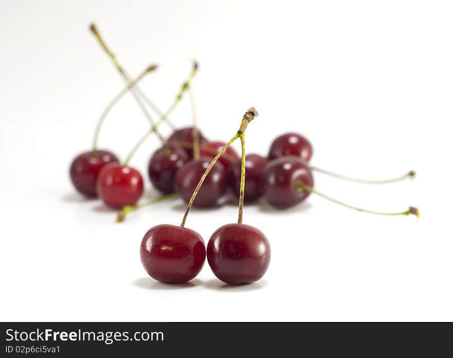 Sweet cherries with two cherries at front. Sweet cherries with two cherries at front