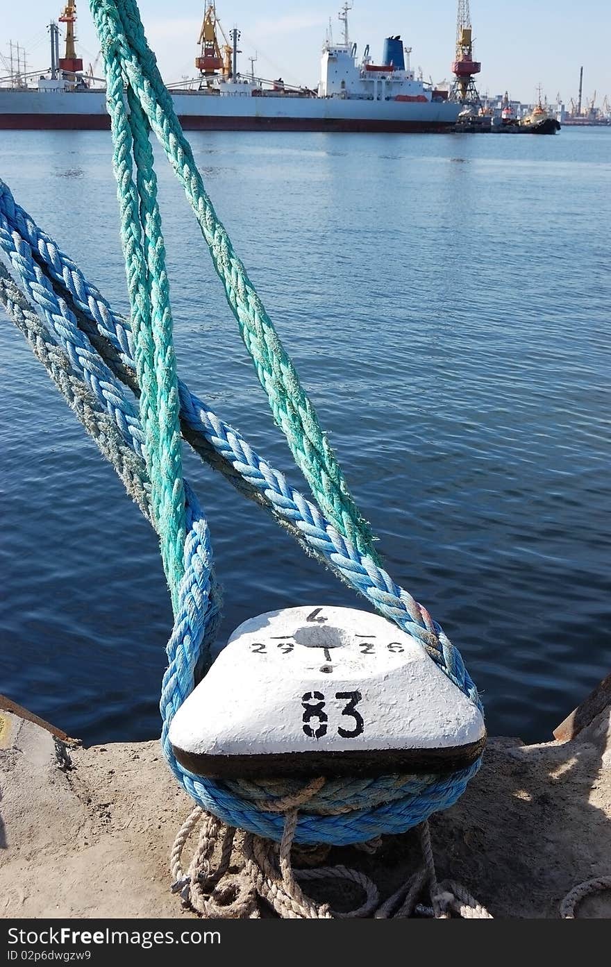 Rope of the ship moored in port. Rope of the ship moored in port